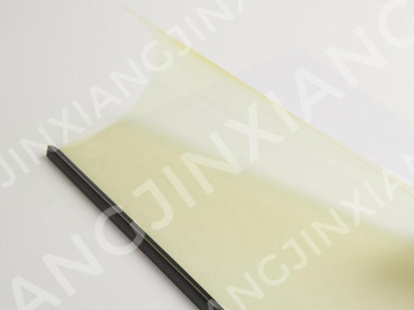 What are the key physical properties that make PVC transparent film suitable for book covers?